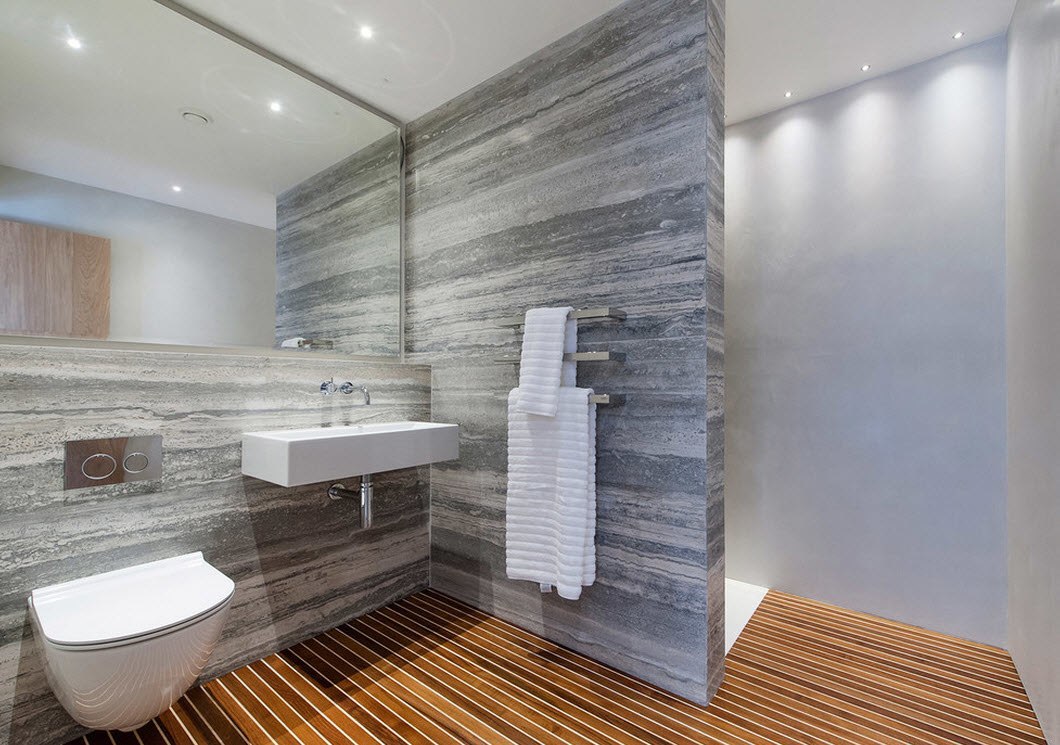 nuostabaus stiliaus vonios kambarys su šviesios spalvos dušu
