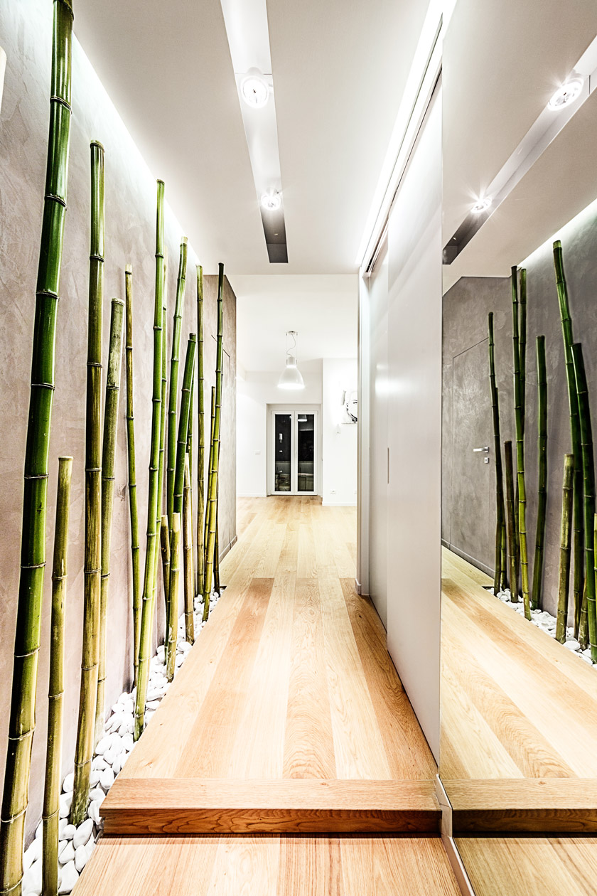 tapetes ar bambusu guļamistabas interjerā