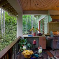 Ideja par verandas oriģinālo dizainu mājas fotoattēlā