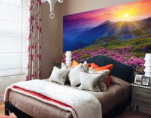 Zonsondergang over de bergen in de slaapkamer met fotomuurschildering