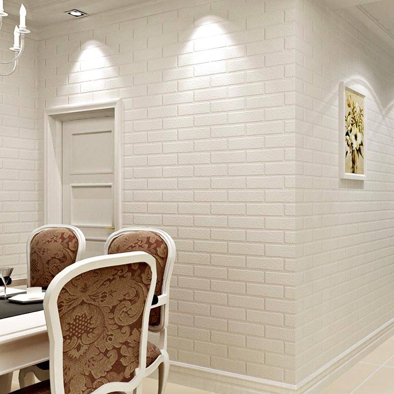 Fehér tégla fal a nappali belső részén