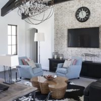 Black wood beams in a white living room