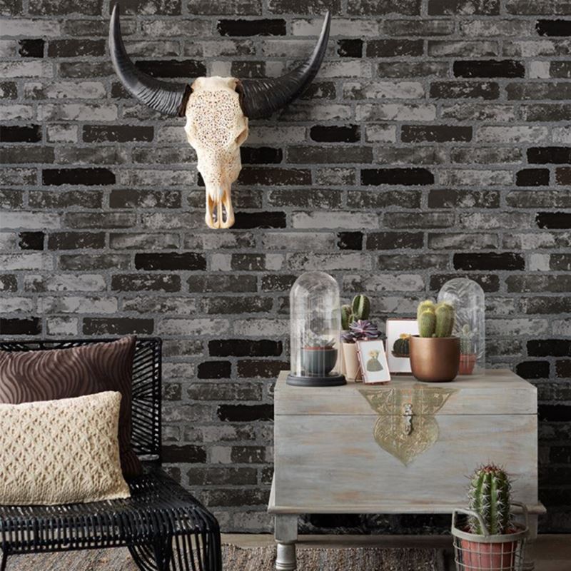 Gray-black wallpaper with the image of bricks