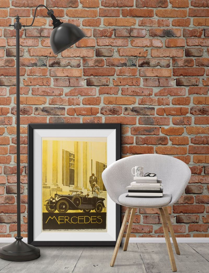 Black floor lamp on a background of wallpaper with brickwork