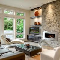 Fireplace in the living room with panoramic windows.