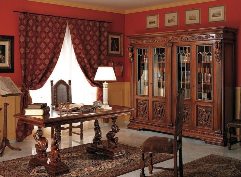 Interior de birou în stil renascentist, cu pereți roșii