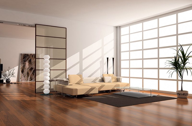 Bahagian dalam ruang tamu yang luas di sebuah rumah persendirian dengan gaya minimalis