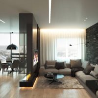 Melna krāsa studijas tipa dzīvokļa dizainā