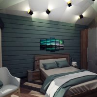 Camera da letto in tonalità scure in una casa di legno