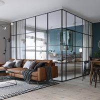 Camera da letto in un cubo di vetro con tende