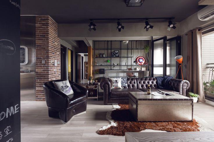 Kožený nábytek v interiéru obývacího pokoje v průmyslovém stylu