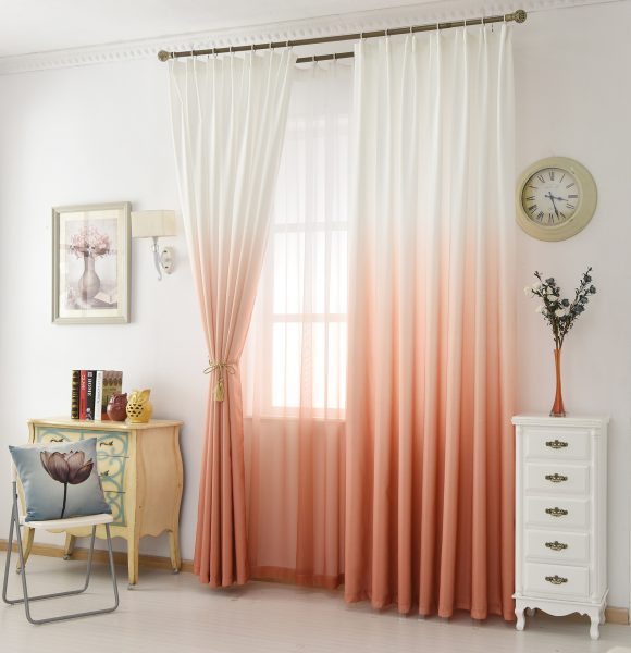 The famous ombre crept into the design of the curtains - a beautiful blurry transition from pastel to saturated tones looks especially impressive if the curtain is assembled in a narrow pickup in the middle of the length, as in the photo.